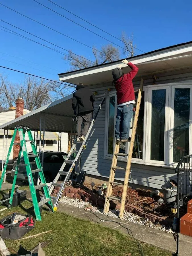 Restoration crew performing exterior repair in Columbiana